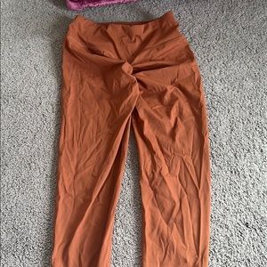 Brown high waisted athletic leggings with scrunch